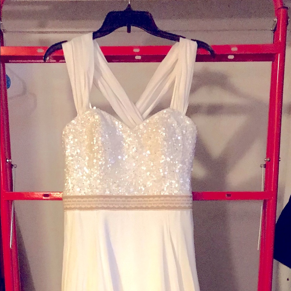Custom made, hand sequined, silk wedding dress.